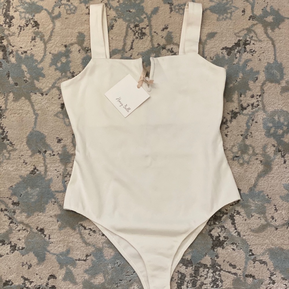 White honey belle onesie never worn
